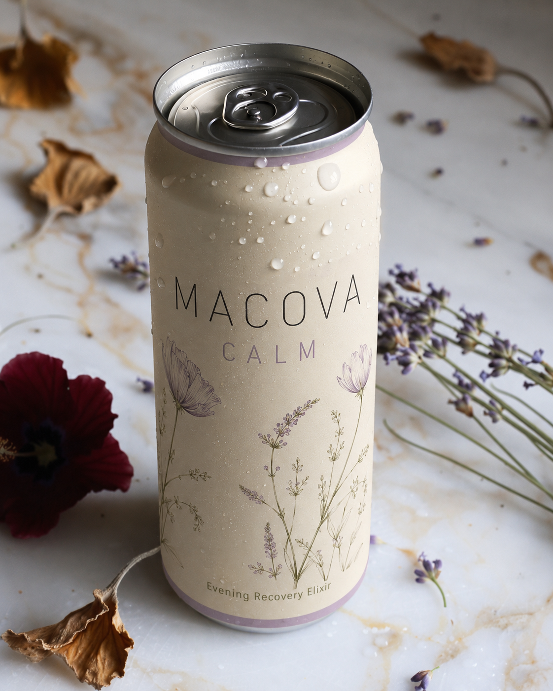 Pink MACOVA drink over ice in a rocks glass